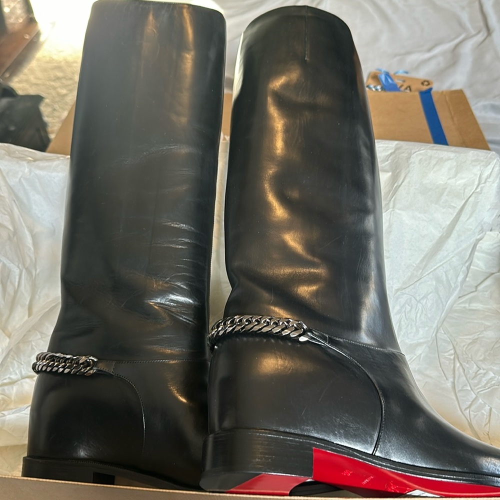 Christian Loubatain size 8 1/2 boots purchased and never worn like new !